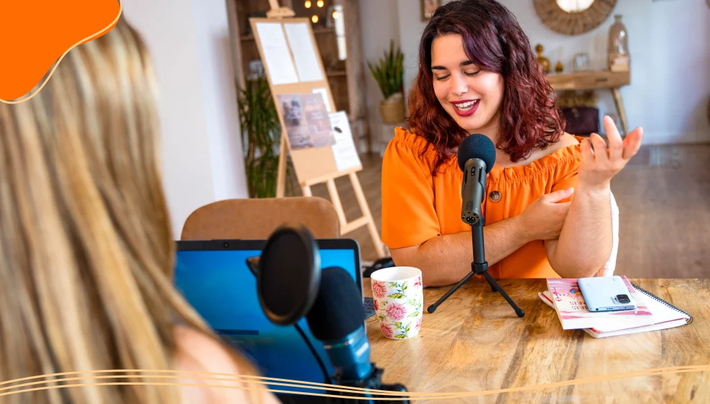 Podcast recording studio. Women recording an interview for the radio