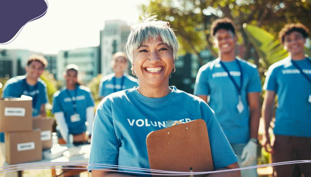 Activism, portrait and smile of woman volunteer outdoor in park for community food drive or donation
