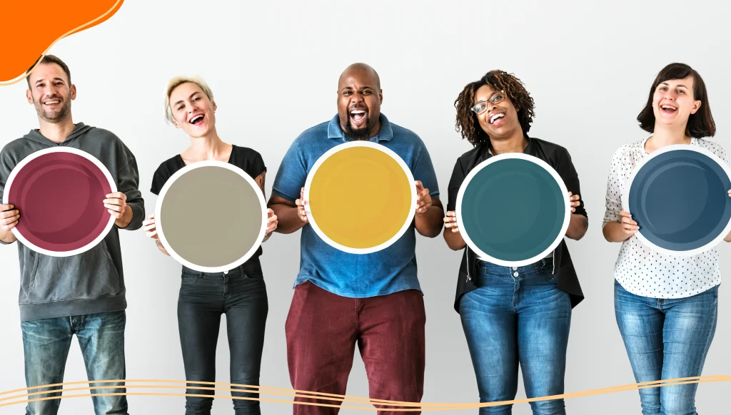 Diverse people holding blank round board