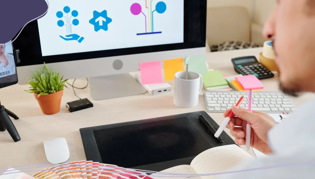 Graphic designer choosing a color for a pictorial mark logo